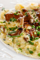 Traditional scrambled eggs with fresh chanterelle.