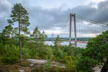 Hogakustenbron, suspension bridge in the High Coast area in Sweedn on a cloudy day. Hoga Kusten trail starting point.