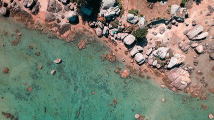 tregastelle beach, cote d'armor in northern brittany, splendid pink granite rock, aerial photo