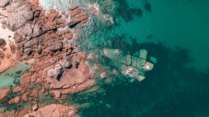tregastelle beach, cote d'armor in northern brittany, splendid pink granite rock, aerial photo