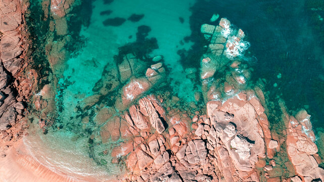 tregastelle beach, cote d'armor in northern brittany, splendid pink granite rock, aerial photo