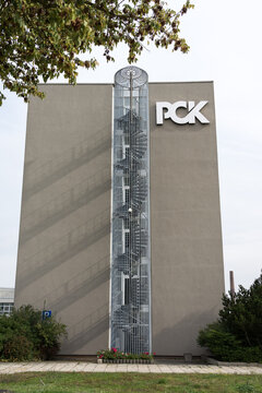 SCHWEDT, GERMANY - SEPTEMBER 24, 2022: The logo of PCK Raffinerie GmbH oil processing plant. The PCK refinery supplies 95 percent of the Berlin and Brandenburg areas with fuel.