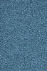 Fototapeta na wymiar Blue woven surface close up. Linen textile texture. Fabric net vertical background. Textured braided len wallpaper. Macro