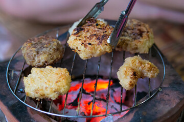 Khao jee a street food Thai style grill sticky rice, with egg paste.