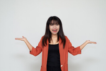 close up attractive adult business woman asian girl showing surprise or excited and screaming with happy and smile against white concrete wall office with concrete background and blank copy space.