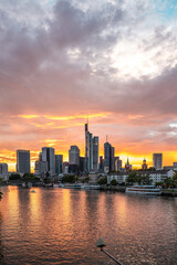 Sunset on the Mein river with a skyline in the background. Romantic city shot of Frankfurt, Hessen, Germany