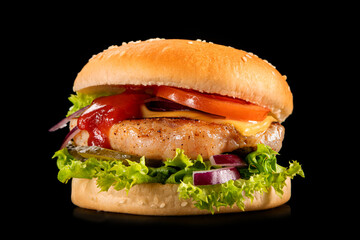 Fresh tasty fillet burger isolated on a black