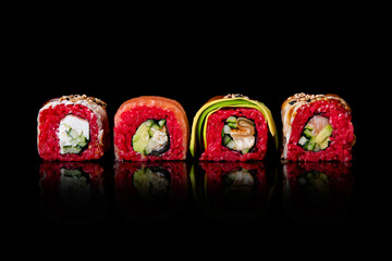 Set of red sushi isolated on a black