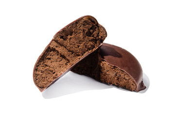 Broken piece of chocolate candy with cocoa filling mousse