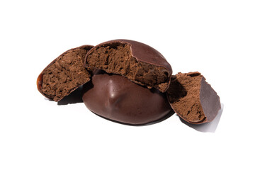 Broken piece of chocolate candy with cocoa filling mousse