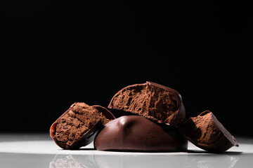 Chocolate mousse candy, round shape, broken pieces