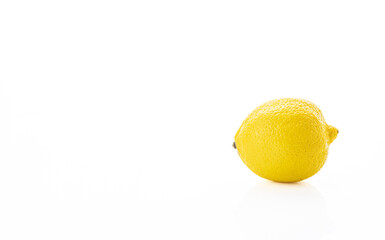 lemon isolated on white background. front view with copy space on left side 