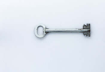 Old key isolated on white background.