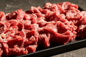 Thinly sliced raw meat, beef