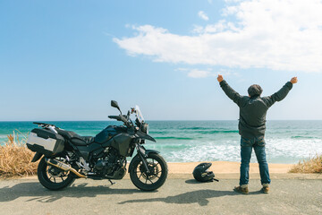 Fototapeta na wymiar 海とバイク