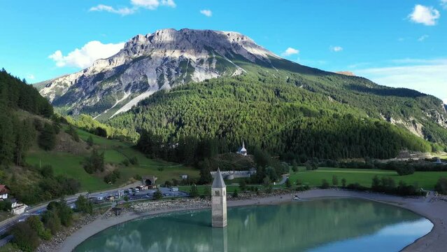 drone flight over Lake Reschensee in South Tyrol