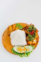 RIce with green chili chicken on the plate
