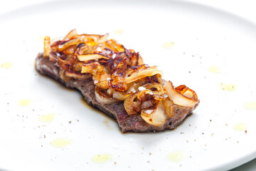 steak covered by caramelized onion