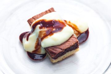marble sponge cake with creamy custard sauce