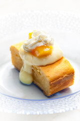 sponge cake with vanilla custard, peach and whipped cream
