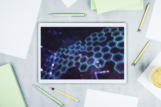 Creative concept of wireless technology with hexagon hologram on modern digital tablet screen. Big data and database concept. Top view. 3D Rendering