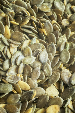 Close up picture of pumpkin seeds, selective focus.