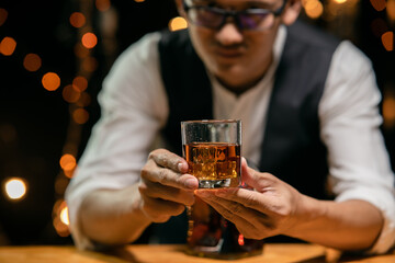 Barman pouring whiskey whiskey glass beautiful night