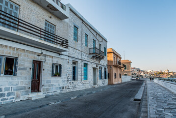 Fototapeta na wymiar Syros port on a colorful summer day, Cyclades, Aegean sea, Greece
