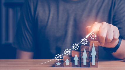Growth arrow on wood block step up, showing business financial icon, human, partner investment, Growth chart, target and high profit income or benefit. Business improvement concept. 