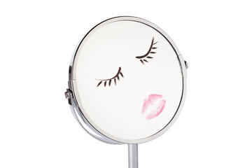 Print of lips and eyelashes on mirror maked by red lipstick and black mascara. Painted face drawing on facial mirror. Desktop make up cosmetic mirror isolated. Home metal mirror close up isolated