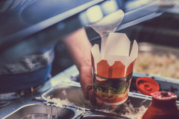 Preparing kebab box in the city