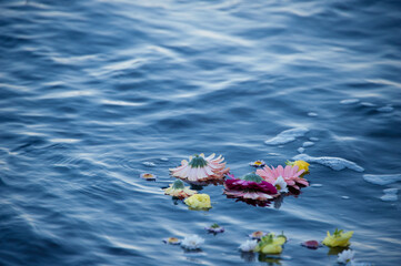 Sacred Sea Woman throwing flowers to the sea.  - 533154162