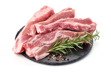 Pork fillet tenderloin with rosemary, raw meat, close-up, isolated on white background.