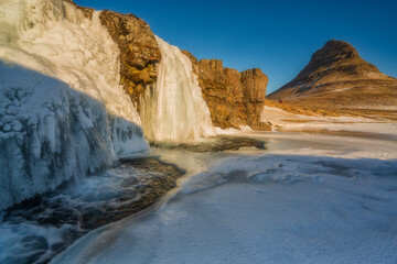 Kirkjufell (“Church Mountain”) is a distinctly shaped mountain found on the north coast of Iceland's Snæfellsnes Peninsula.