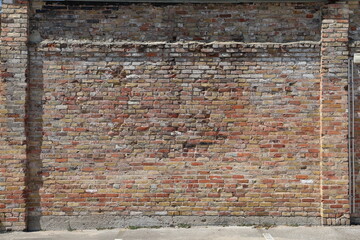 A weathered outdoor brick wall