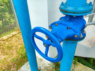 Fototapeta na wymiar JOHOR, MALAYSIA -AUGUST 1, 2022: Pipe valve is used to control the quantity of water or liquid passing through a pipe. This valve is also used for pipe connections.
