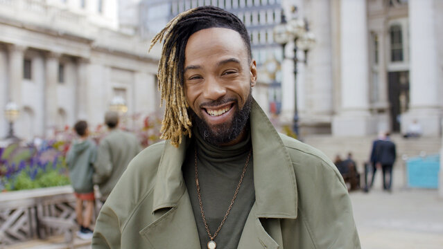 Portrait of handsome and stylish young man smiling to camera - Powered by Adobe