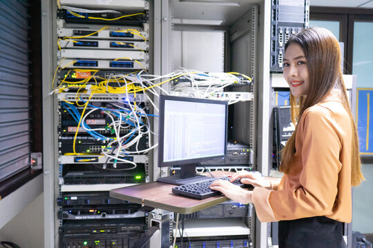 Engineer Businesswoman In Network Server Room