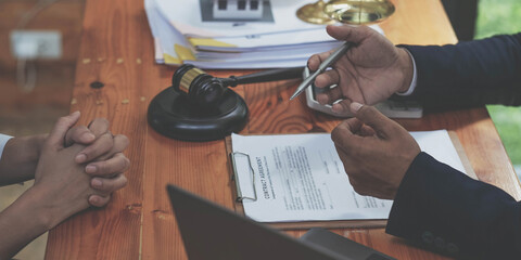 Business people negotiating a contract. man hands working with documents at desk and signing...