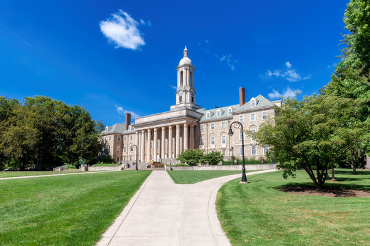 The Old Main building on the campus of Penn State University in spring sunny day, State College, Pennsylvania.