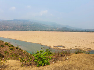 Jadukata River - a beautiful river near the India border during the winter season with the hills of...