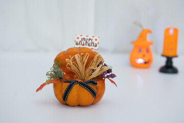 halloween decoration with pumpkin and lantern on white background