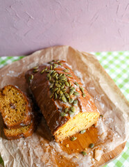 Pumpkin cupcake sprinkled with seeds.  View from above. Close-up