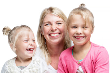 A young mother with two little daughters are hugging and laughing. Love and tenderness. Isolated on white background.