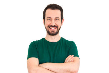 Handsome happy bearded young man smiling with cross arms. Turkish caucasian guy is wearing green t-shirt isolated on white background.