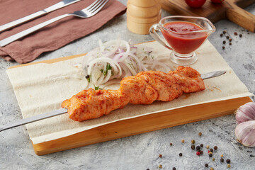 Chicken kebab on a skewer, close up
