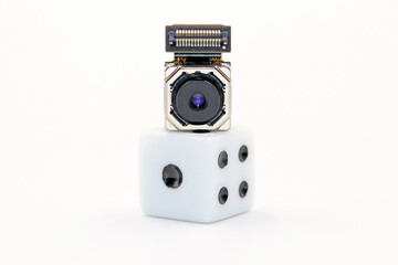 A camera from a mobile phone on a game dice