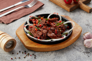 stewed beef in sauce in a pan