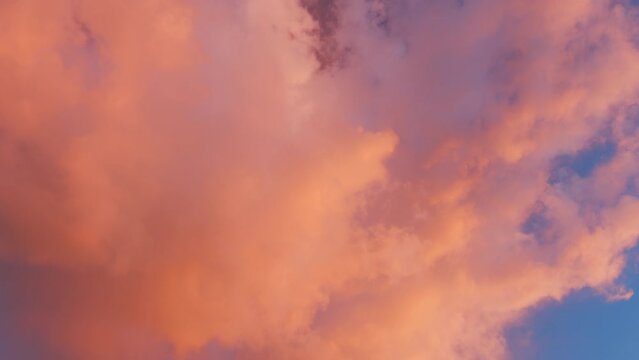 Summer sky at sunset with clouds. Cloudscape in tropical summer sunlight. Timelapse.