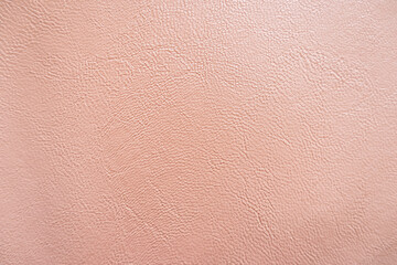 Texture of light pink leather sofa background